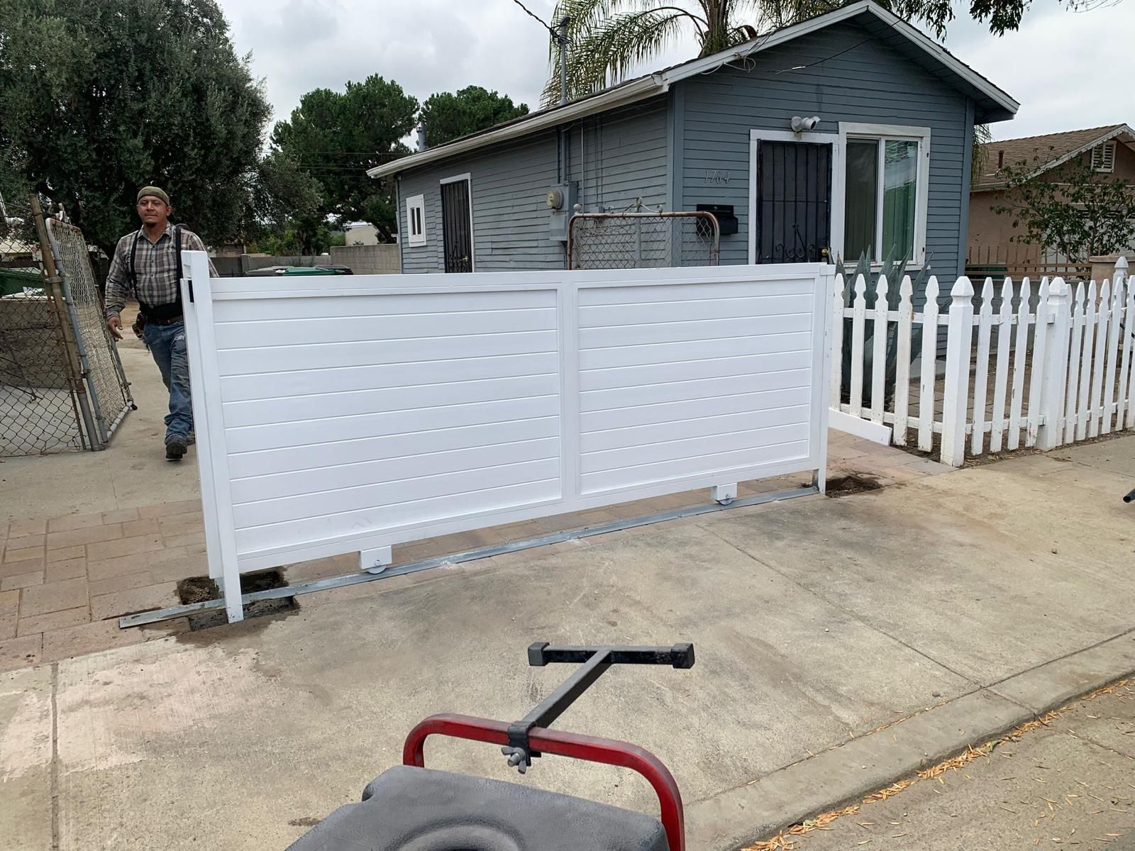White sliding gate